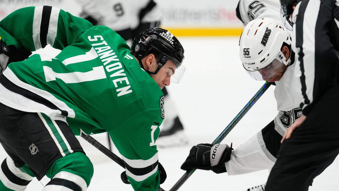 Feb 28, 2025; Dallas, Texas, USA; Dallas Stars center Logan Stankoven (11) sets to faceoff against Los Angeles Kings right wing Quinton Byfield (55) during the first period at American Airlines Center. Mandatory Credit: Chris Jones-Imagn Images