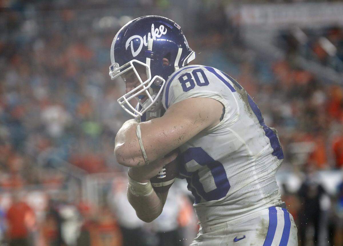 Duke tight end Daniel Helm (80) scores a touchdown during the second half.