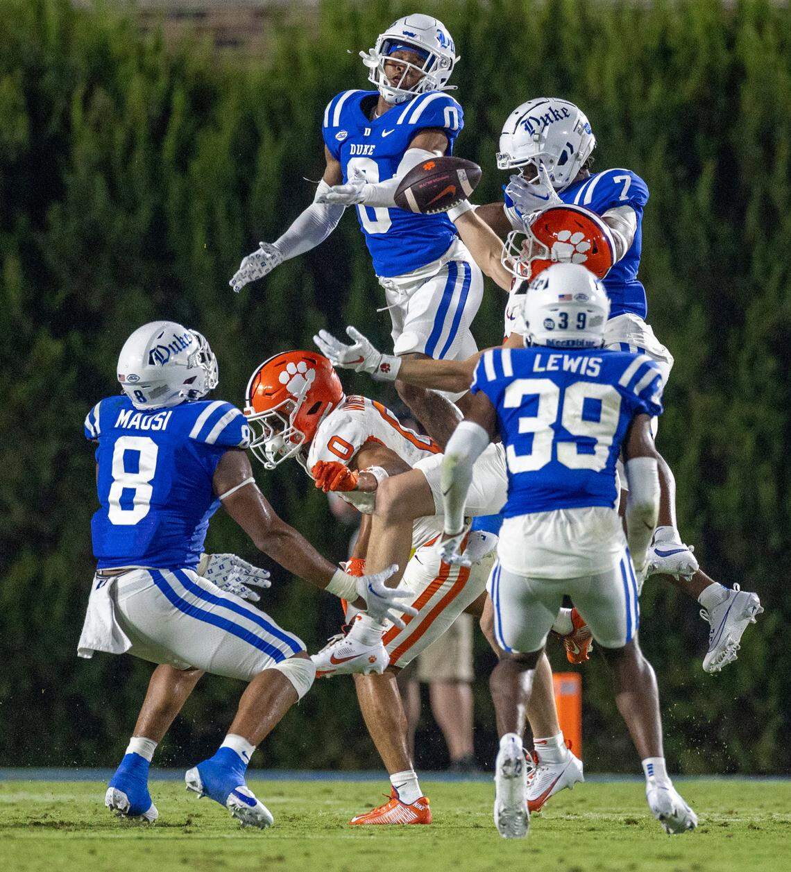 Duke’s Chandler Rivers (0) and Al Blades Jr. (7) try to intercept a pass by Clemson quarterback Cade Klubnik (2), that was deflected at the line of scrimmage in the first quarter on Monday, September 4, 2023 at Wallace Wade Stadium Stadium in Durham, N.C.