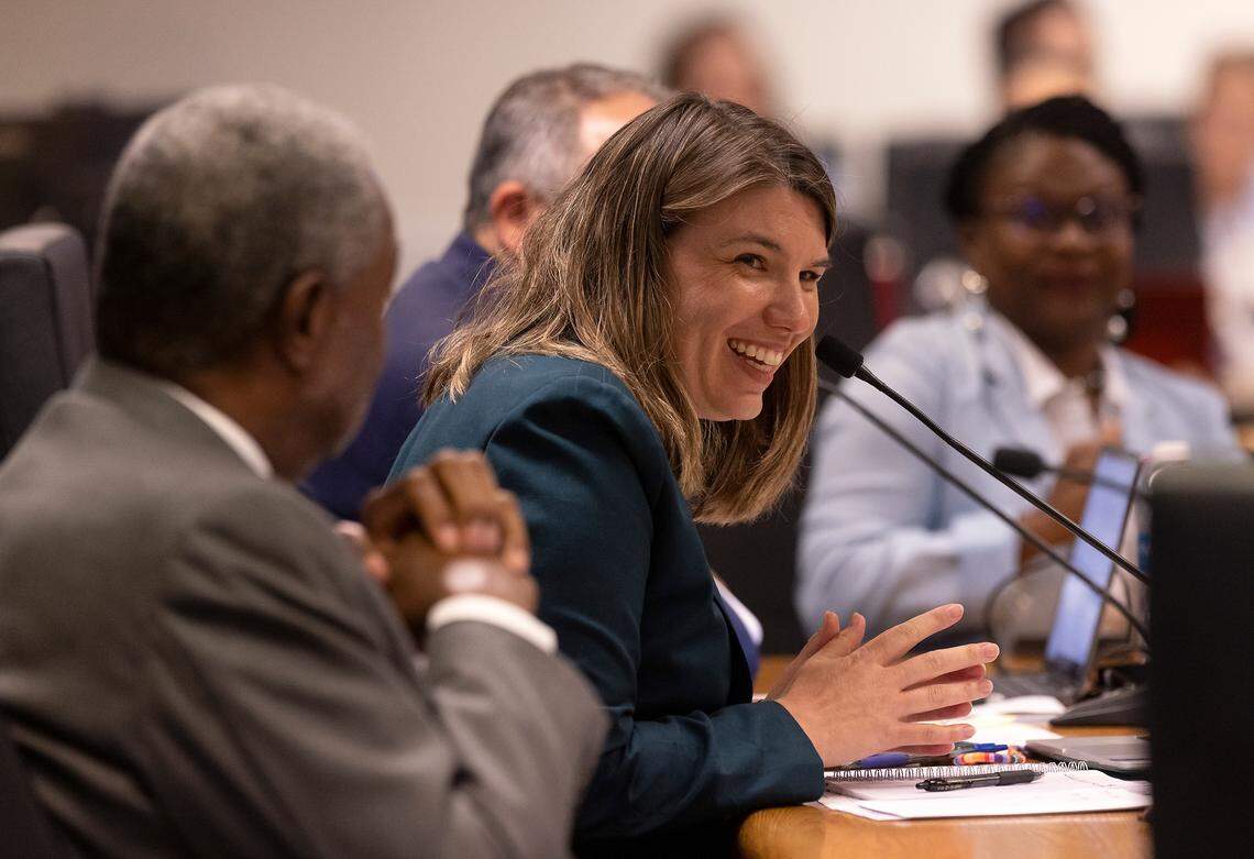 Lindsay Mahaffey, chairwoman of the Wake County school board, reacts after board members voted in favor of Dr. Robert P. Taylor to be Wake County’s new superintendent on Tuesday, July 18, 2023, in Cary, N.C.