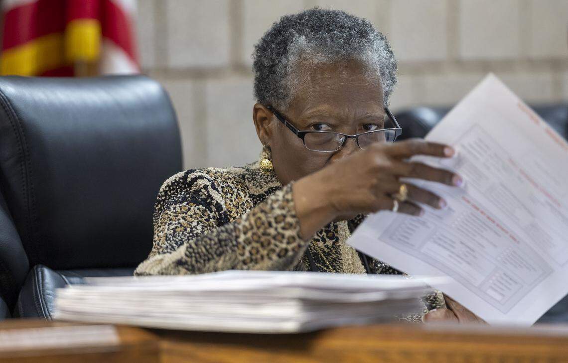 Rockingham County Board of Elections member Ophelia Wright inspects provisional ballots in the race between North Carolina Senate President Pro Tempore Phil Berger and his challenger, Rockingham County Sheriff Sam Page, on Friday, March 6, 2026 in Reidsville, N.C.