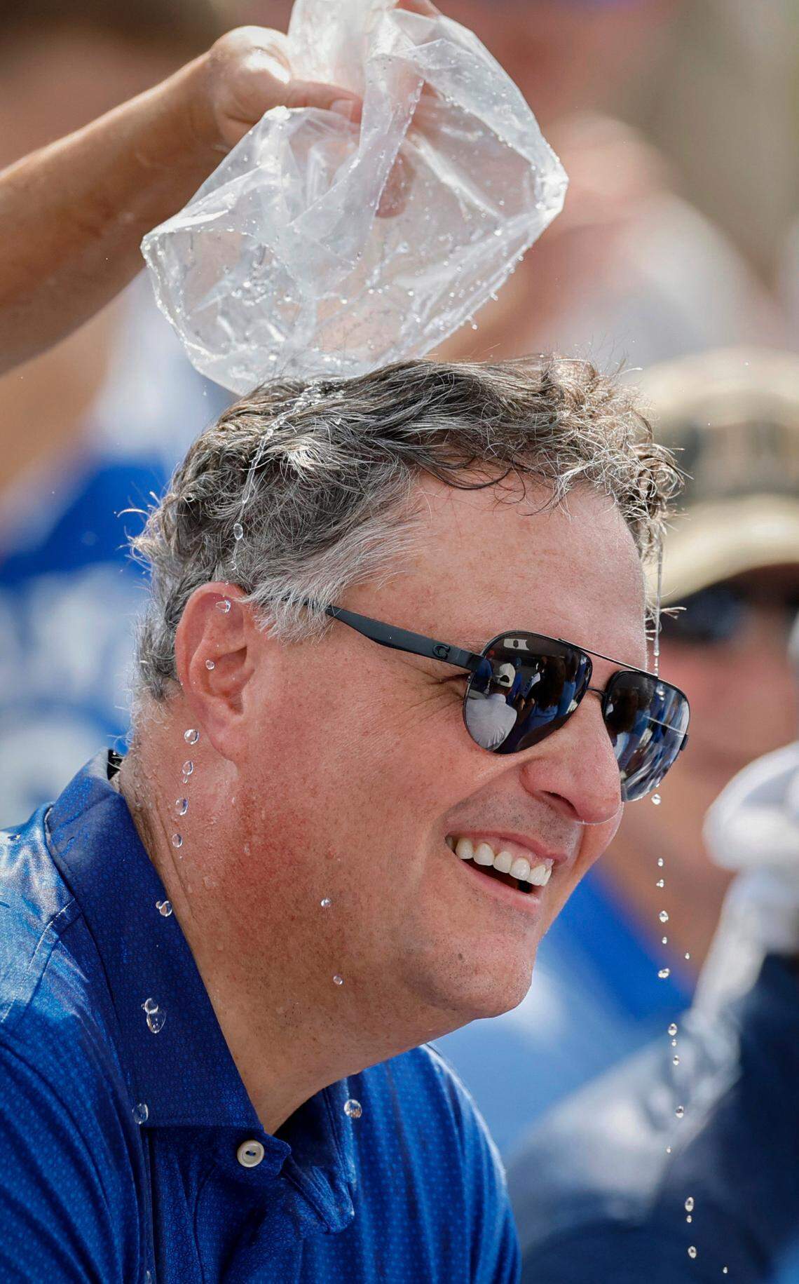 Duke alum Mark McLaughlin gets ice water dumped on his head to cool him down during Duke’s 7-4 victory over Murray St. in the first game of Durham Super Regional at Jack Coombs Field in Durham, N.C., Sat. June 7, 2025.