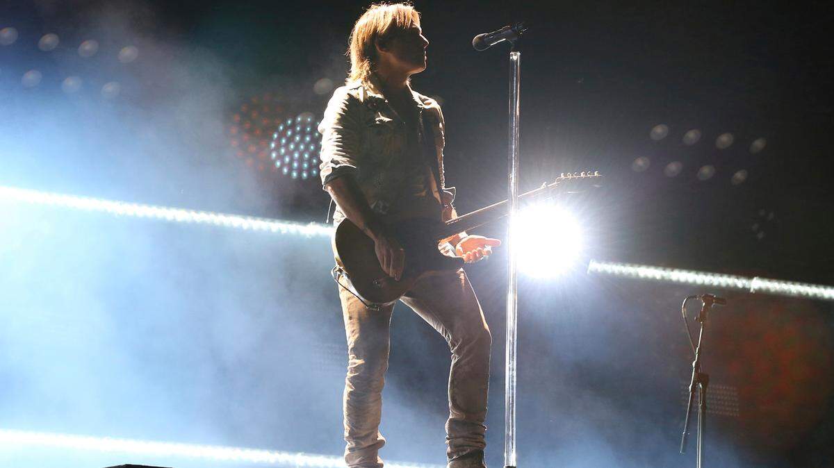 Artist Keith Urban performs at the 2018 CMA Music Festival at Nissan Stadium on Saturday, June 9, 2018 in Nashville, Tenn. Urban will play at the Coastal Credit Union Music Park at Walnut Creek in Raleigh in July. .(Photo by Laura Roberts/Invision/AP)