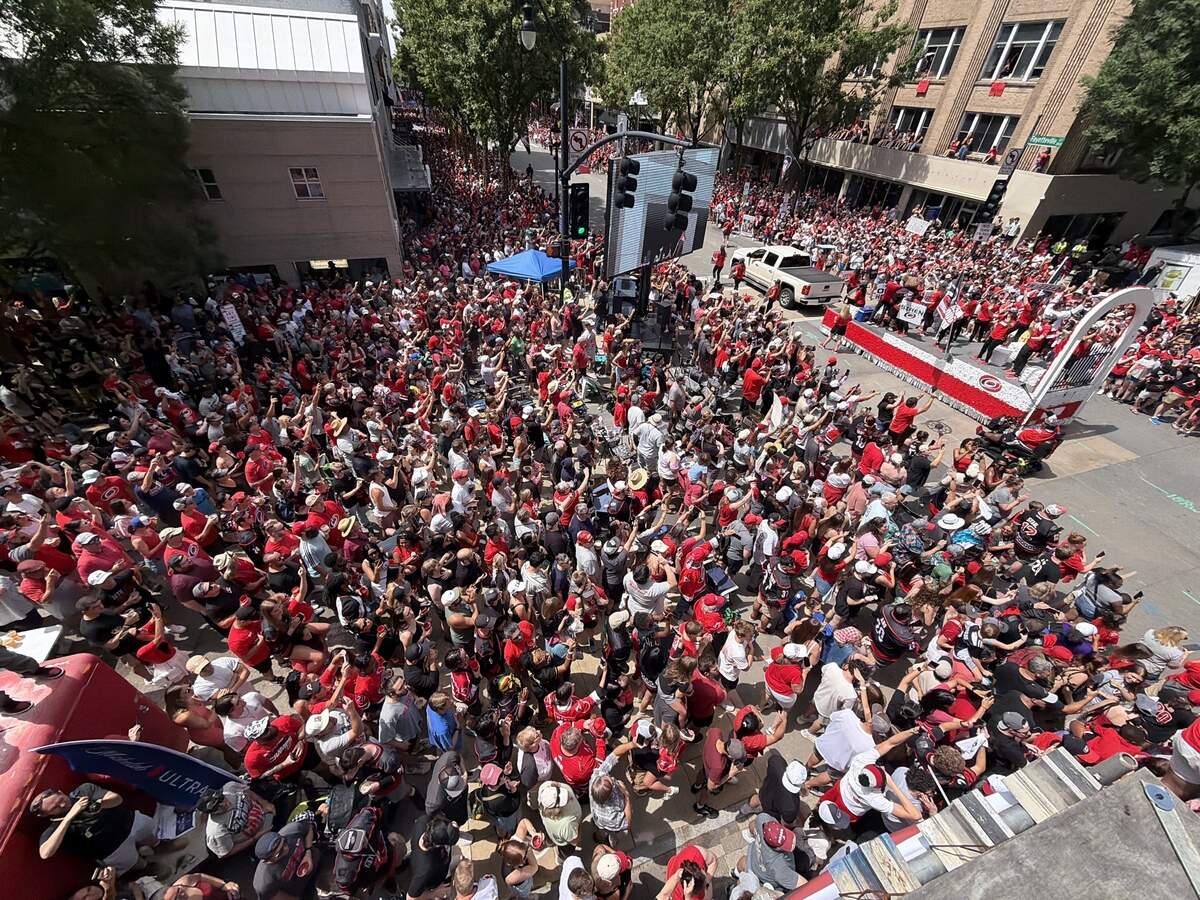 The parade celebrating the Carolina Hurricanes Stanley Cup Championship makes its way down Fayetteville Street in Raleigh.