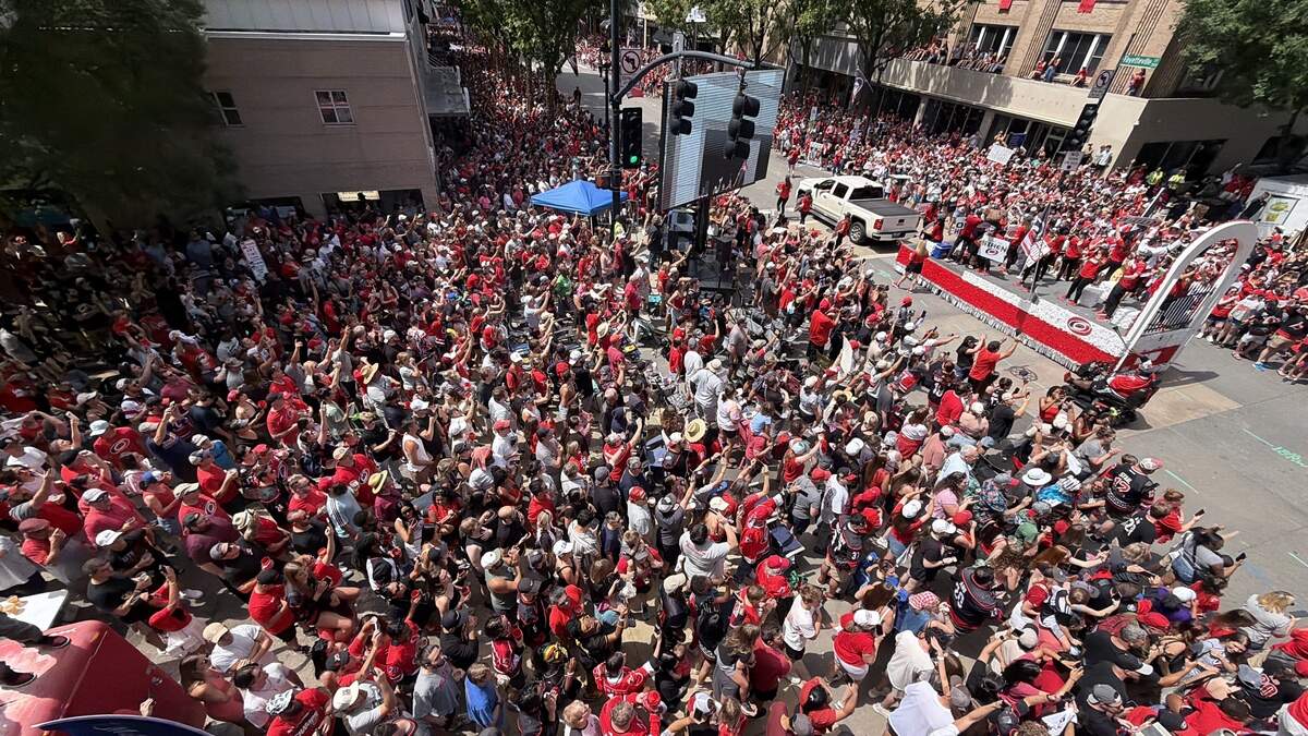 The parade celebrating the Carolina Hurricanes Stanley Cup Championship makes its way down Fayetteville Street in Raleigh.