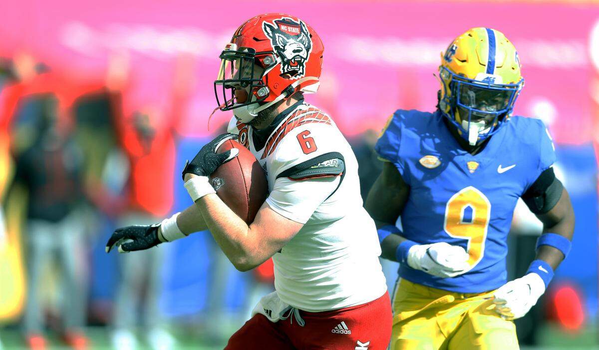 N.C. State’s Cary Angeline (6) catches a touchdown pass during the Wolfpack’s game against the Pittsburgh Panthers at Heinz Field in Pittsburgh, PA, Saturday, Oct. 3, 2020.
