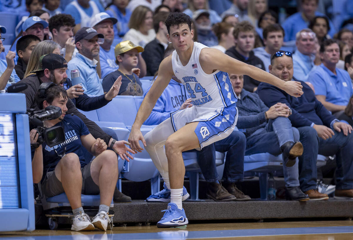 North Carolina guard Luka Bogavac (44) stops short of taking a seat with fans, after chasing a loose ball out of bounds, during the first half against Central Arkansas on Monday, November 3, 2025 at the Smith Center in Chapel Hill, N.C.
