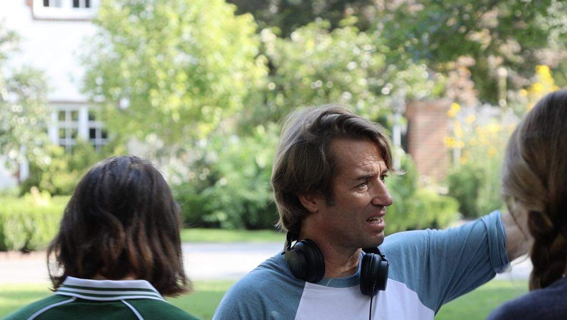 North Carolina native Jonas Pate on the Wilmington set of “The Runarounds,” a new Amazon Prime series about a fictional band formed the summer after graduating&nbsp;high school. Pate is also the creator of Netflix’s popular series, “Outer Banks.” Scenes like the one in this Wilmington neighborhood hint at a revival of North Carolina’s film industry across the state after various factors slowed it down.