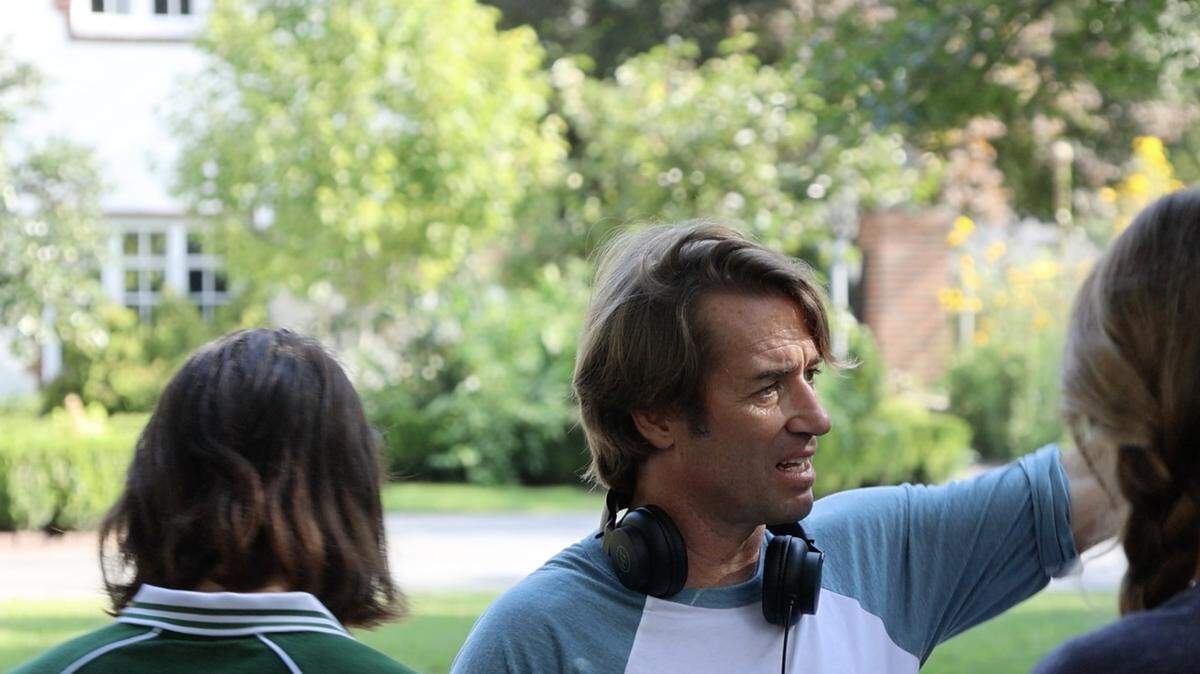 North Carolina native Jonas Pate on the Wilmington set of “The Runarounds,” a new Amazon Prime series about a fictional band formed the summer after graduating high school. Pate is also the creator of Netflix’s popular series, “Outer Banks.” Scenes like the one in this Wilmington neighborhood hint at a revival of North Carolina’s film industry across the state after various factors slowed it down.