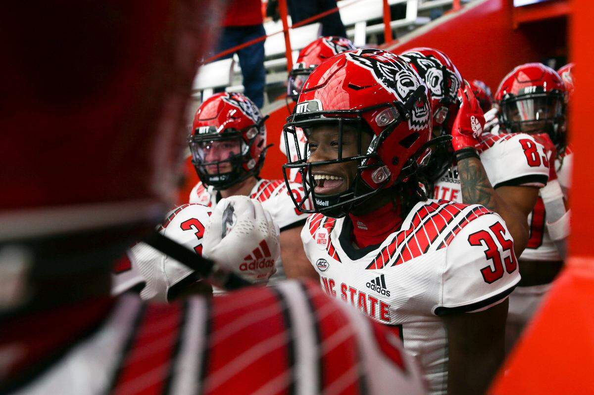 North Carolina State defensive back Christopher Scott Jr. (35) smiles before taking the field for warm ups before an NCAA college football game against Syracuse on Saturday, Oct. 15, 2022, in Syracuse, N.Y. (AP Photo/Joshua Bessex)