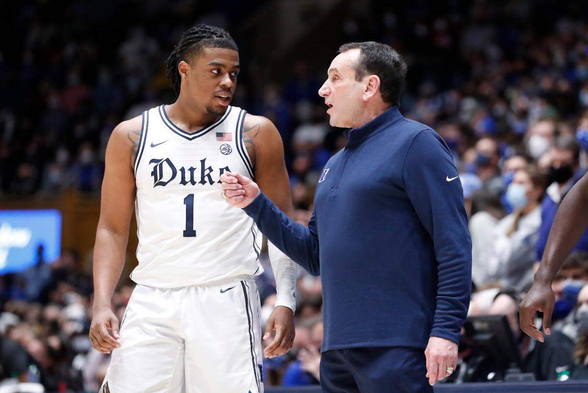 Duke head coach Mike Krzyzewski talks with Trevor Keels (1) during the second half of Duke’s 88-73 victory over N.C. State at Cameron Indoor Stadium in Durham, N.C., Saturday, January 15, 2022.