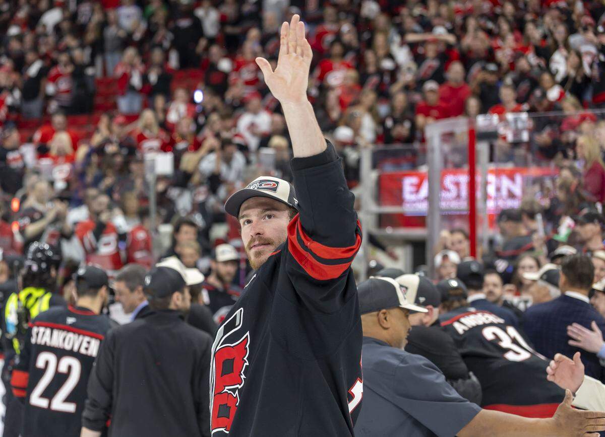 Carolina Hurricanes right wing Andrei Svechnikov (37) waves to fans before leaving the ice following their 6-1 victory over Montreal, clinching the Eastern Conference and advancing to the Stanely Cup Finals on Friday, May 29, 2026 at Lenovo Center in Raleigh, N.C.