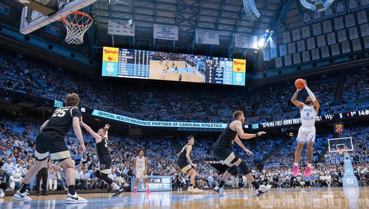 North Carolina’s R.J. Davis (4) launches a three-point shot in the first half against Wake Forest on Monday, January 22, 2024 at the Smith Center in Chapel Hill, N.C.