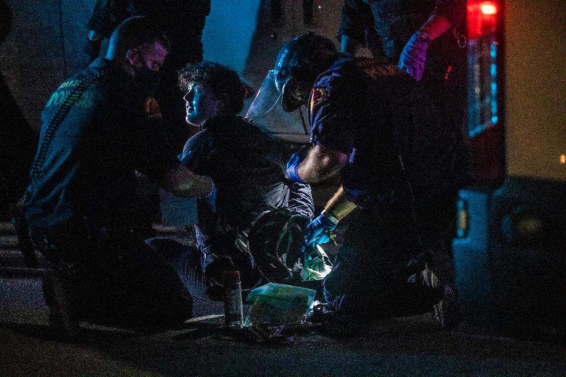 Raleigh Police arrest a protester in downtown Raleigh Saturday Sept. 26, 2020. Demonstrators protested the decision by a Kentucky grand jury to clear three Louisville police officers of criminal wrongdoing in the shooting death of Breonna Taylor.