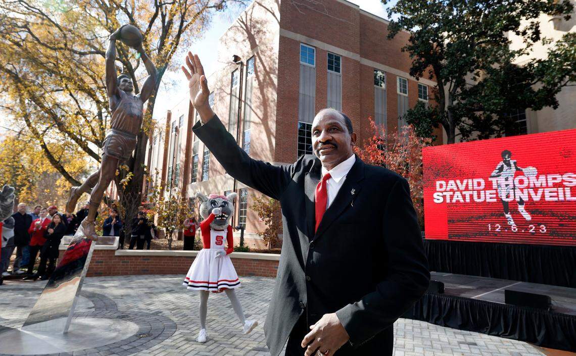 \N.C. State’s David Thompson acknowledges the crowd after his statue was unveiled outside Reynolds Coliseum in Raleigh, N.C., Wednesday, Dec. 6, 2023.
