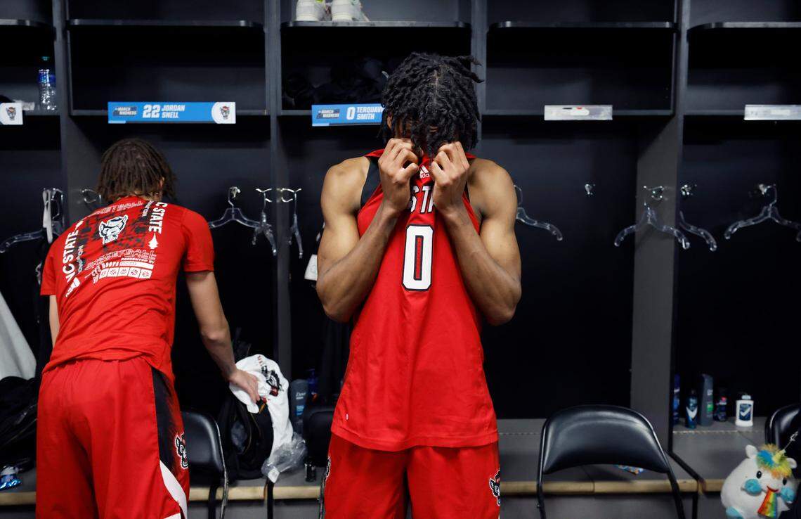 N.C. State’s Terquavion Smith (0) stands in front of his locker after Creighton’s 72-63 victory over N.C. State in the first round of the NCAA Tournament at Ball Arena in Denver, Colo., Friday, March 17, 2023.