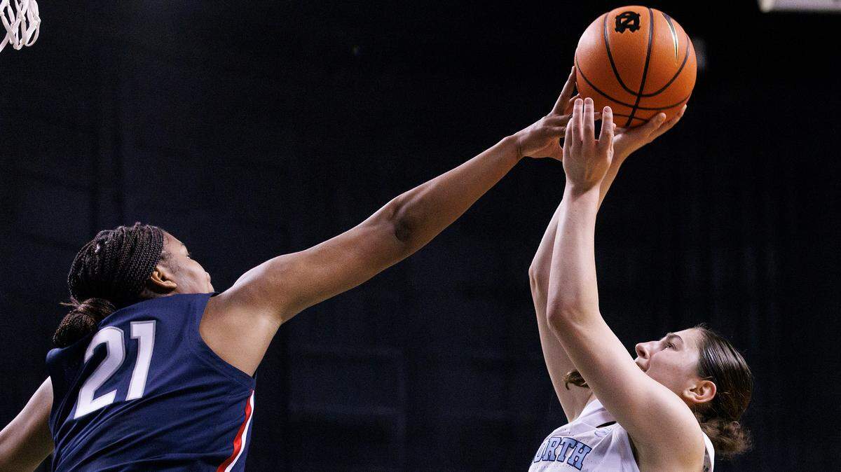 UConn’s Sarah Strong contests a shot by North Carolina’s Lanie Grant during the second half of the Tar Heels’ 69-58 loss on Friday, Nov. 15, 2024, at First Horizon Coliseum in Greensboro, N.C.
