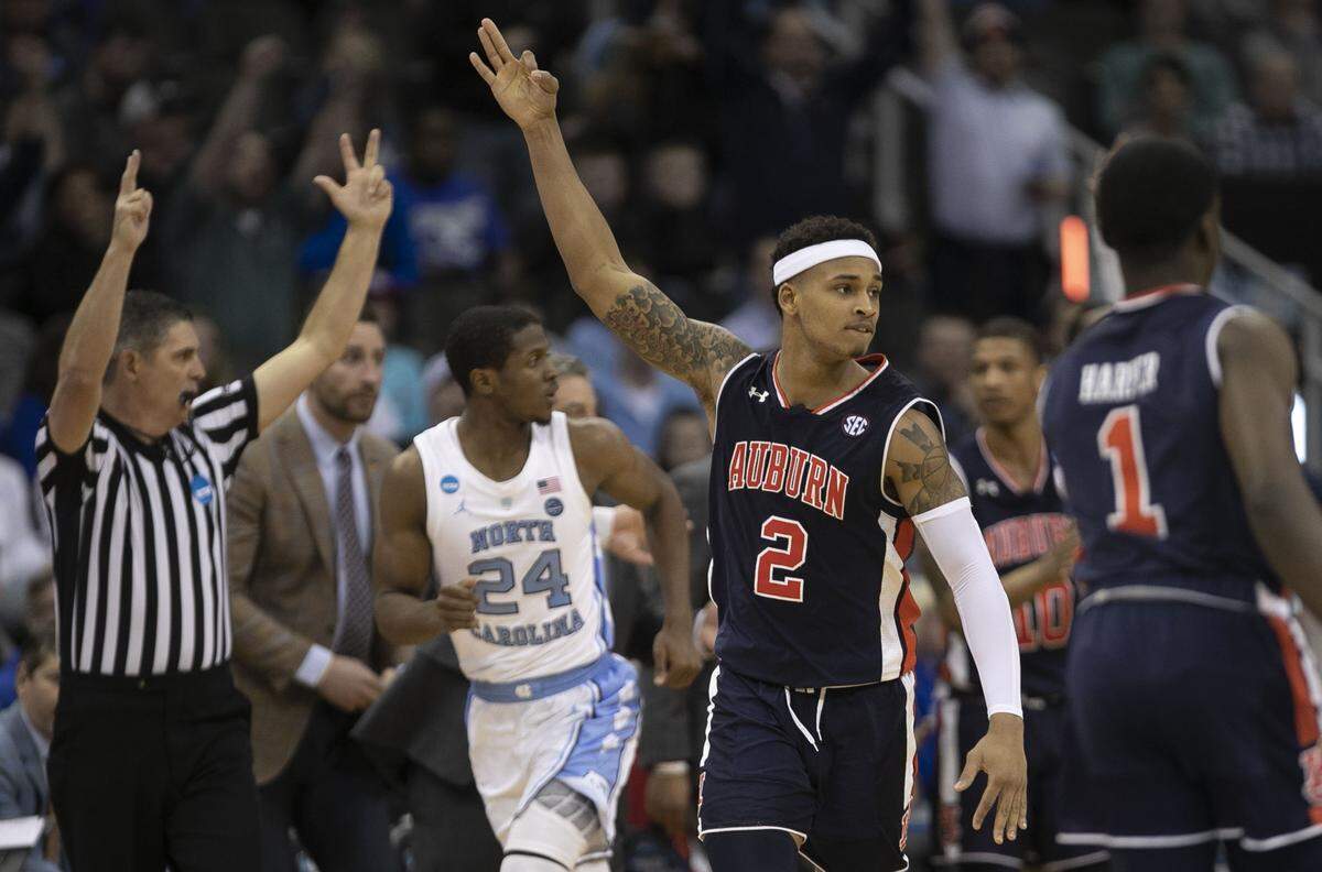 Auburn’s Bryce Brown (2) celebrates after a three-point basket during the second half against North Carolina during their NCAA Sweet 16 matchup on Friday, March 29, 2019 at the Sprint Center in Kansas City, Missouri. Auburn rolled to a 97-80 victory.