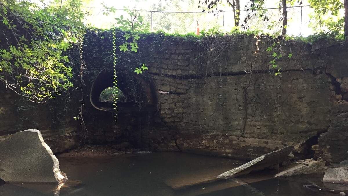 The metal pipe that carries a small creek under Clark Avenue will be replaced.