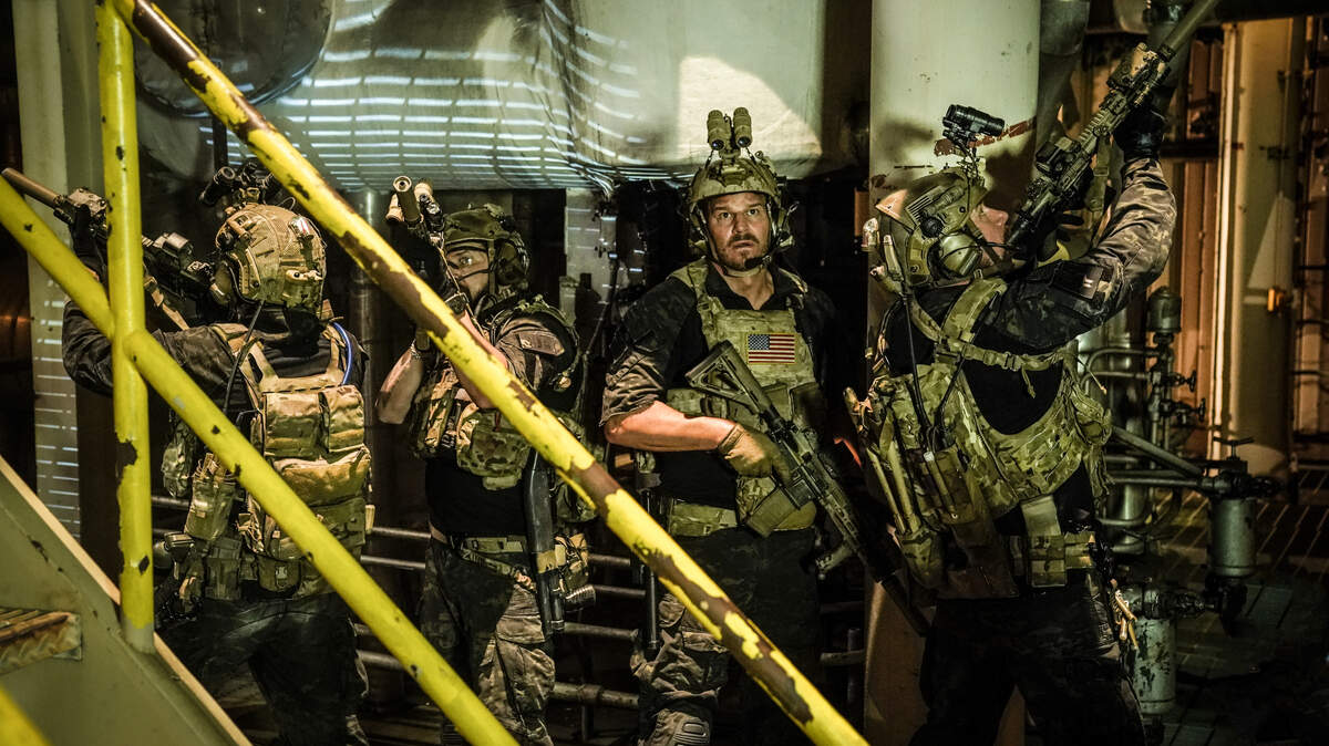 (L-R):AJ Buckley as Sonny Quinn, David Boreanaz as Jason Hayes and Tyler Grey as Trent in the CBS dram “SEAL Team.”