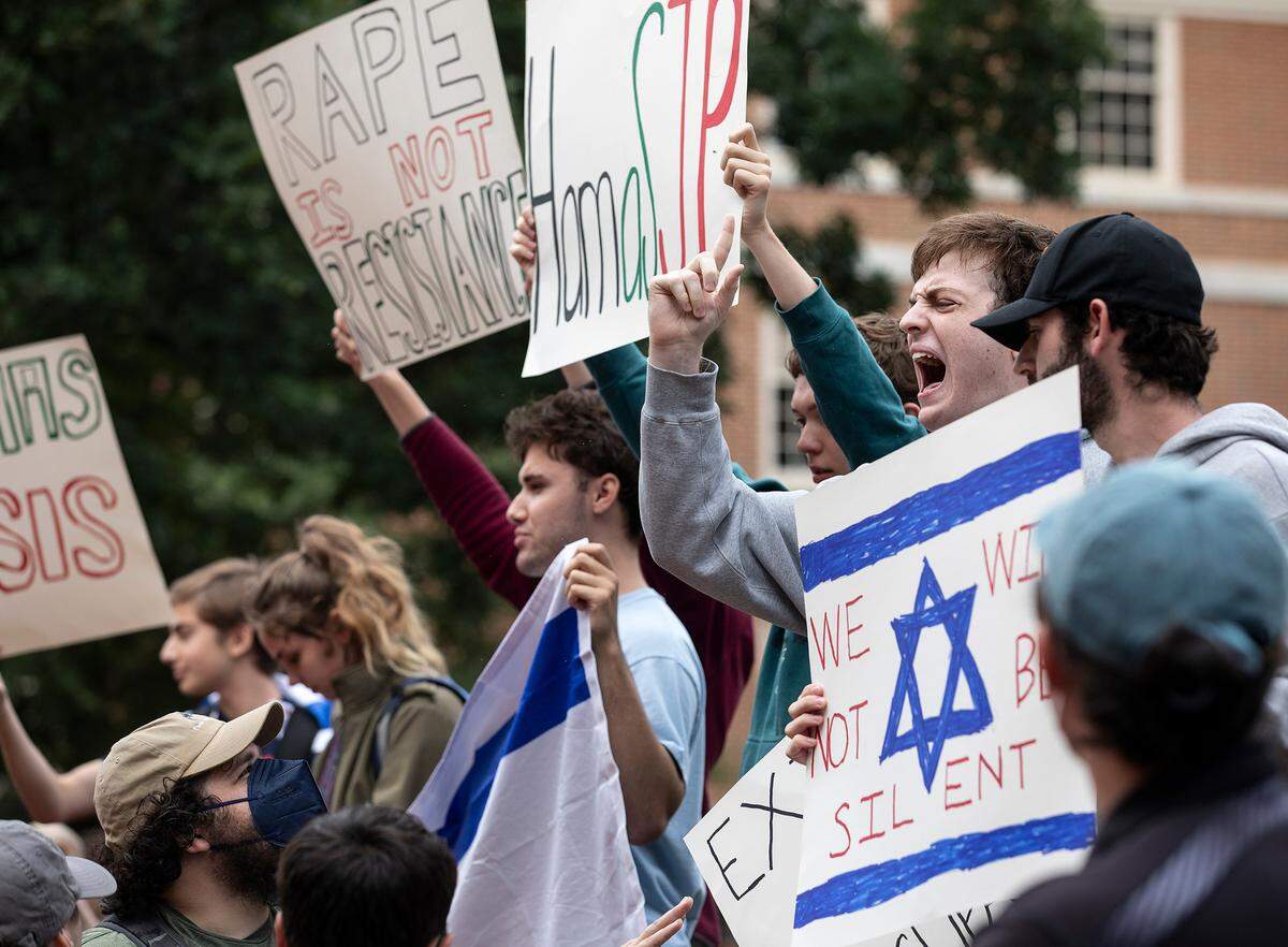 Counter-protesters gather during a rally in support of Palestinians at UNC-Chapel Hill on Thursday, Oct. 12, 2023. The rally, billed as a “Day of Resistance,” was organized by the UNC chapter of Students for Justice in Palestine.