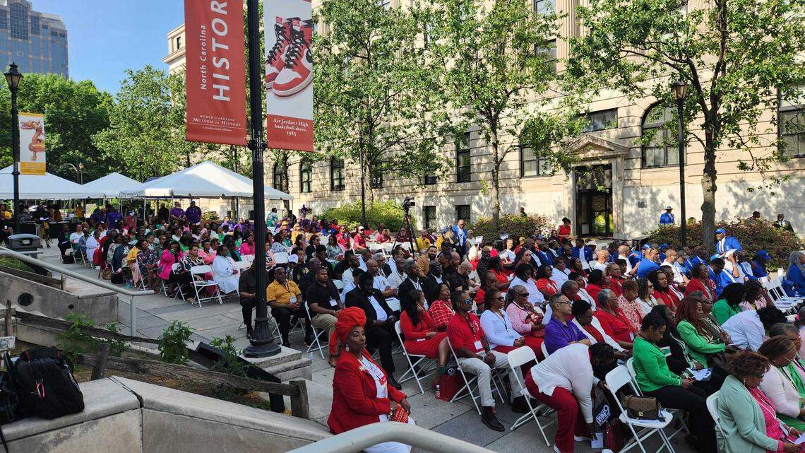 Members of the Divine 9 historic Black sororities and fraternities, dressed in the colors of their organizations, listen to speakers at the annual Divine 9 Legislative Day on Bicentennial Plaza in downtown Raleigh, N.C. on Wednesday, April 30, 2025.