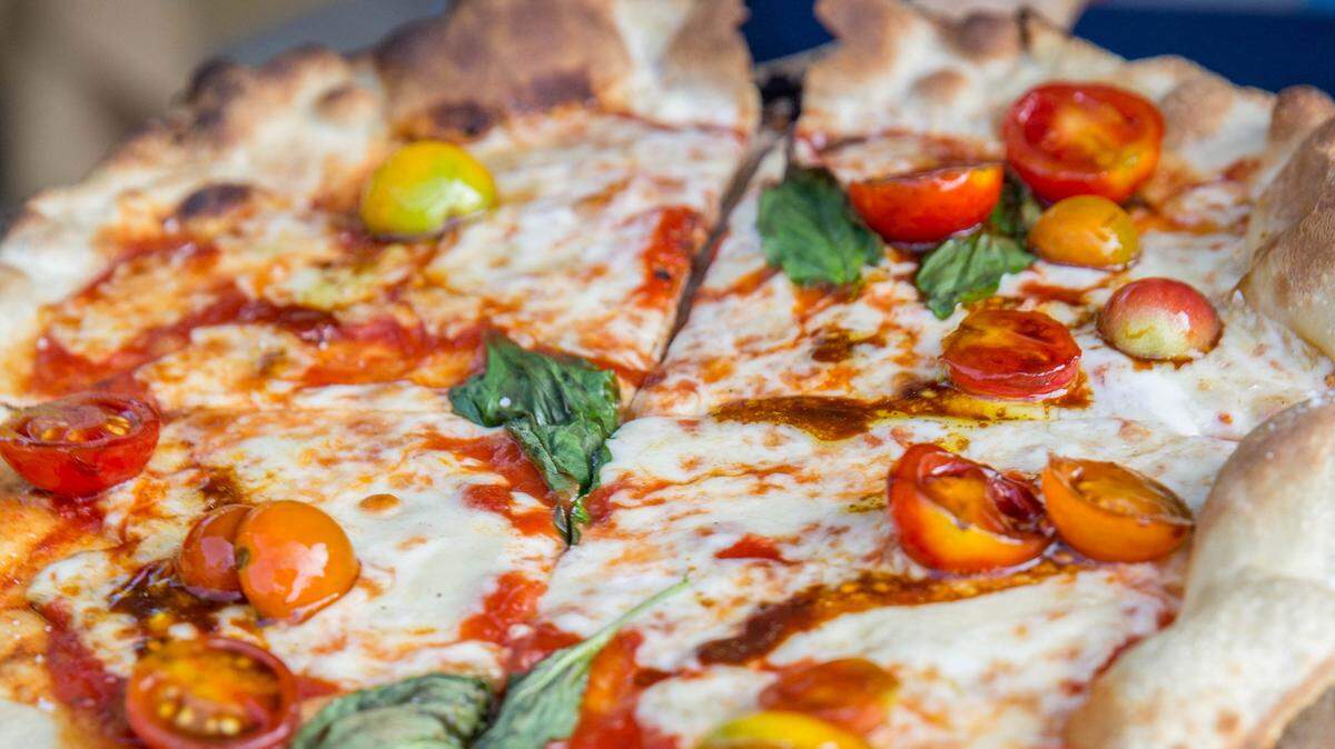 Coronato Pizza opens this week in Carrboro’s new South Green shopping center. The new pizzeria from chef Teddy Diggs specializes in thin crust Roman-style pizzas.