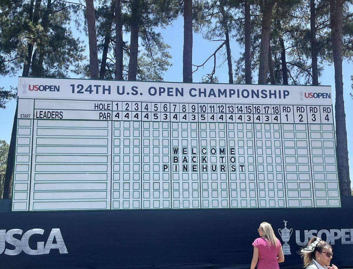 The giant scoreboard in the fan village welcomes new arrivals to Pinehurst ahead of the U.S. Open this week on the No. 2 course at Pinehurst Resort and Country Club.