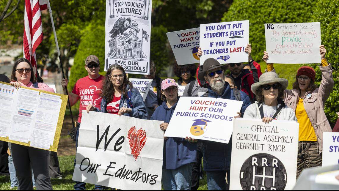 About 50 demonstrators organized by the North Carolina Association of Educators, Public Schools First NC and the North Carolina PTA protest outside the North Carolina Legislative Building on Wednesday, April 8, 2026, during the “wEDnesday for Public Schools” protest over the legislature’s failure to pass a state budget and the North Carolina Supreme Court’s decision to dismiss the long-running Leandro school funding lawsuit and overturn a 2022 court ruling directing the transfer of funds to public schools.