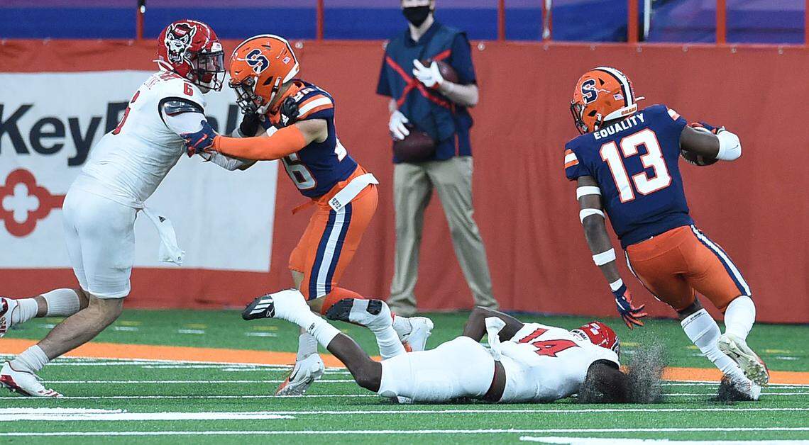 Syracuse Orange linebacker Mikel Jones (13) runs back a interception to the five yard line during a game against North Carolina State on Saturday, Nov. 28, 2020, at the Carrier Dome in Syracuse, N.Y.