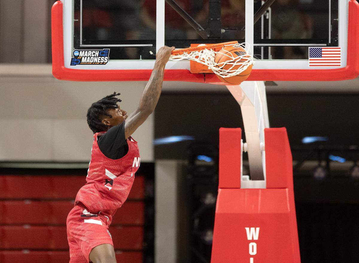 N.C. State’s Trey Parker dunks during a scrimmage at the Primetime with the Pack preseason event on Friday, Oct. 25, 2024, at Reynolds Coliseum in Raleigh, N.C.