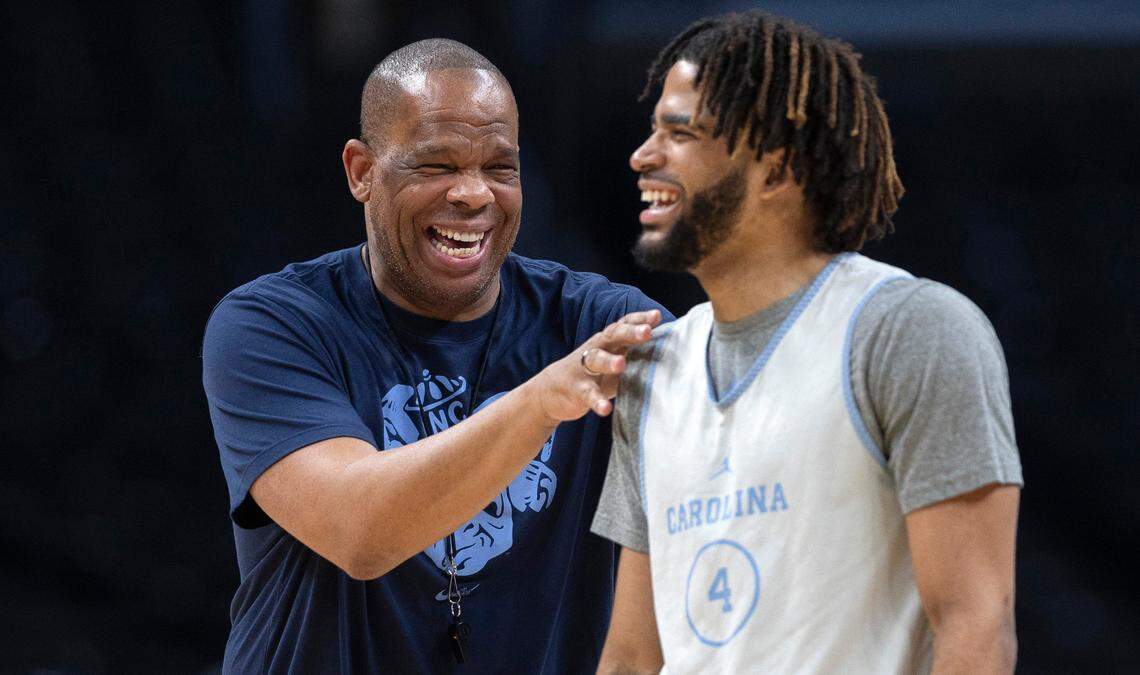 North Carolina coach Hubert Davis laughs with R.J. Davis (4) during the Tar Heels’ practice on Wednesday, March 27, 2024 at Crypto.com Arena in Los Angeles, CA.