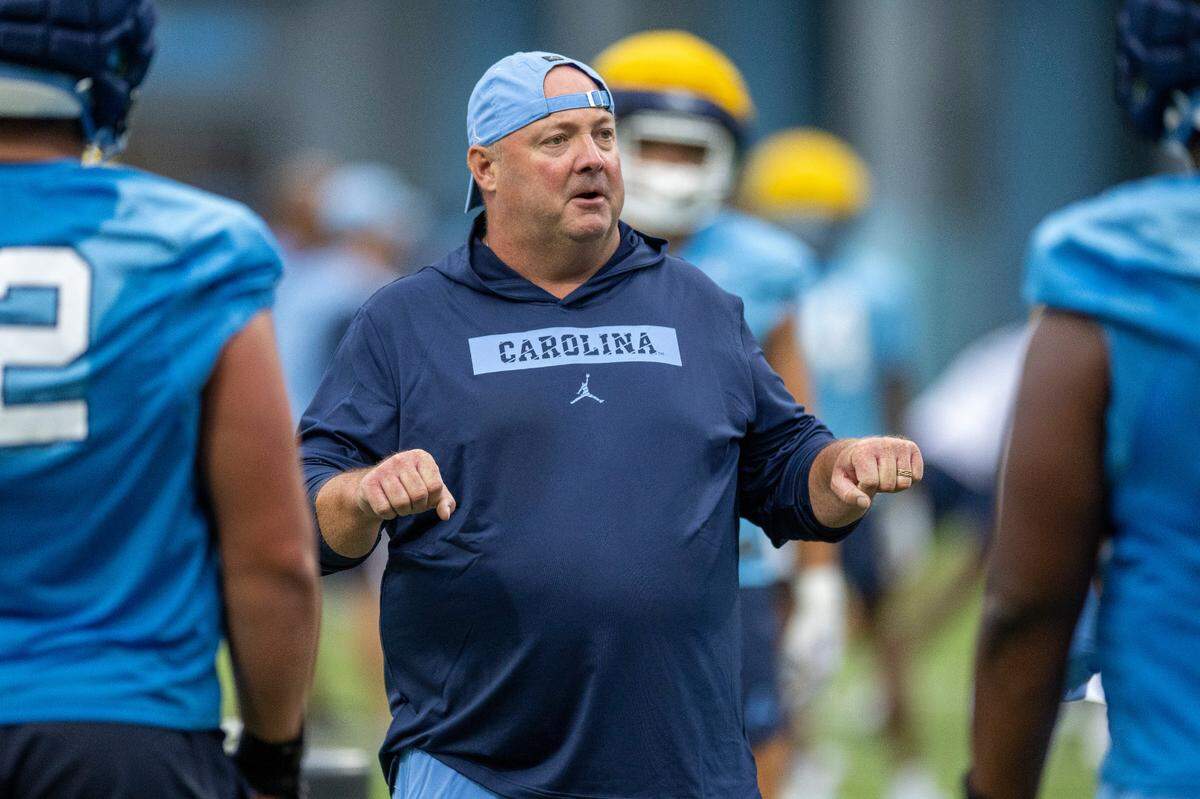 North Carolina tight ends coach Freddie Kitchen works with his players during the Tar Heels’ first practice of the season on Monday, July 29, 2024 in Chapel Hill, N.C.