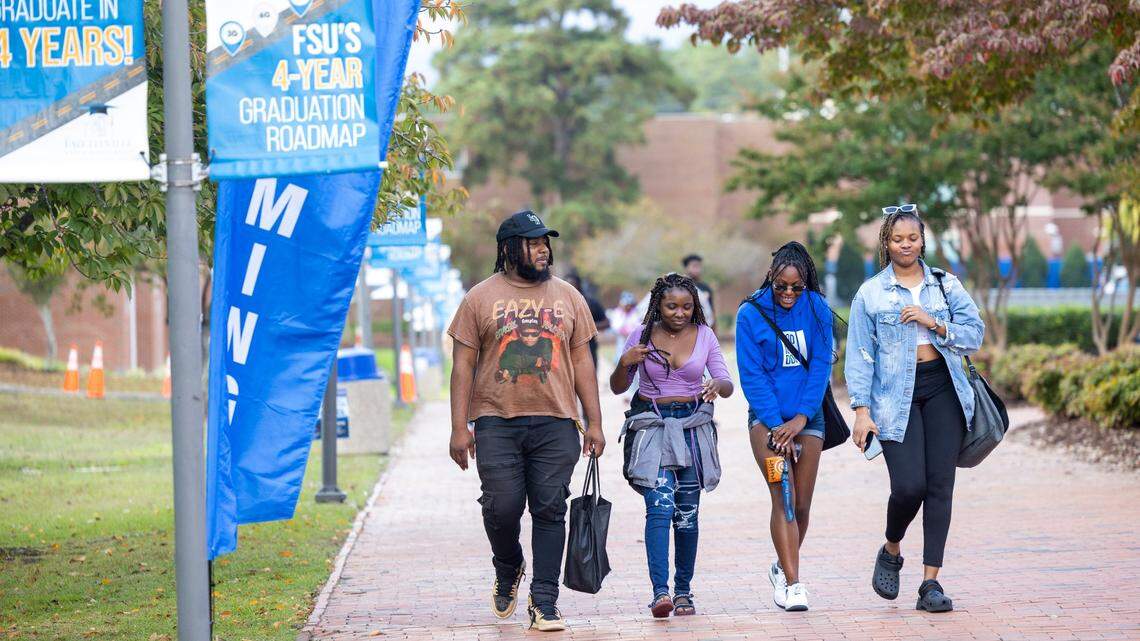 Fayetteville State University students walk on Fayetteville State’s campus Friday, Oct. 20, 2023.