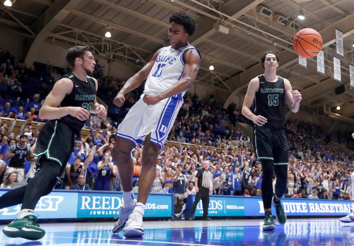 Duke’s Sean Stewart (13) celebrates slamming in two over Dartmouth’s Romeo Myrthil (20) during Duke’s 92-54 victory over Dartmouth at Cameron Indoor Stadium in Durham, N.C., Monday, Nov. 6, 2023.