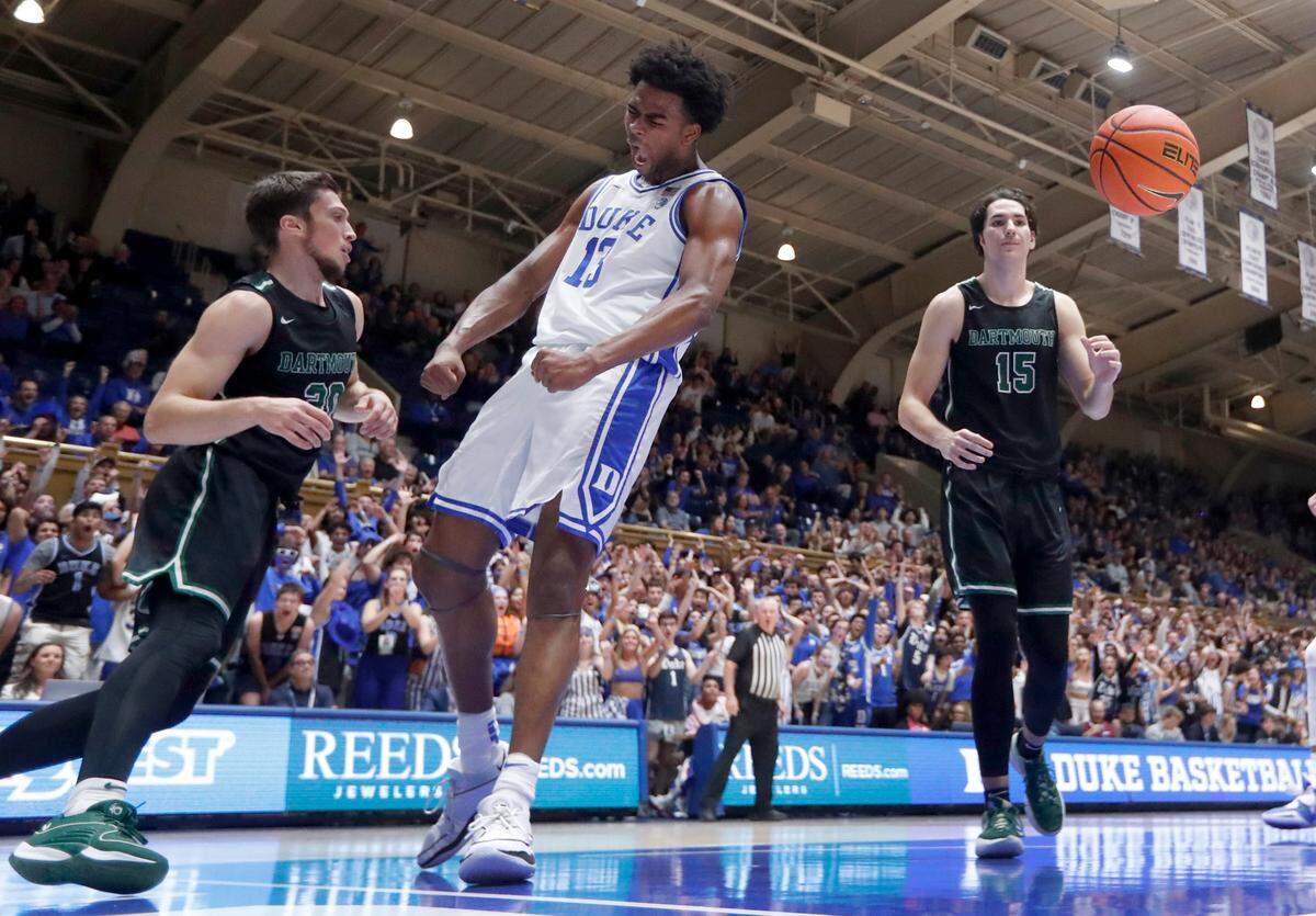 Duke’s Sean Stewart (13) celebrates slamming in two over Dartmouth’s Romeo Myrthil (20) during Duke’s 92-54 victory over Dartmouth at Cameron Indoor Stadium in Durham, N.C., Monday, Nov. 6, 2023.