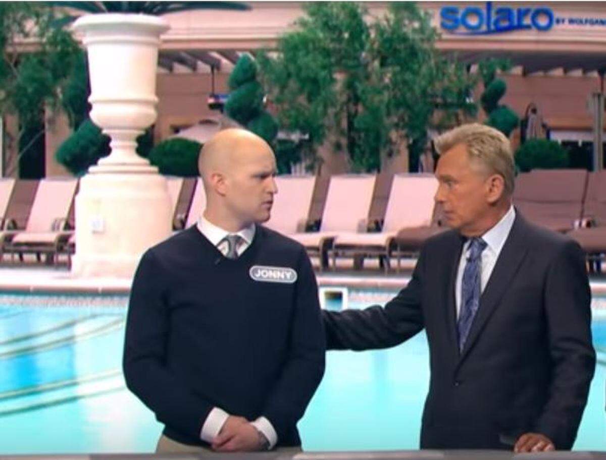 Pat Sajak, right, explains to ‘Wheel of Fortune’ contestant Jonny Knowles, from North Carolina, he didn’t pronounce ‘flamenco’ correctly.