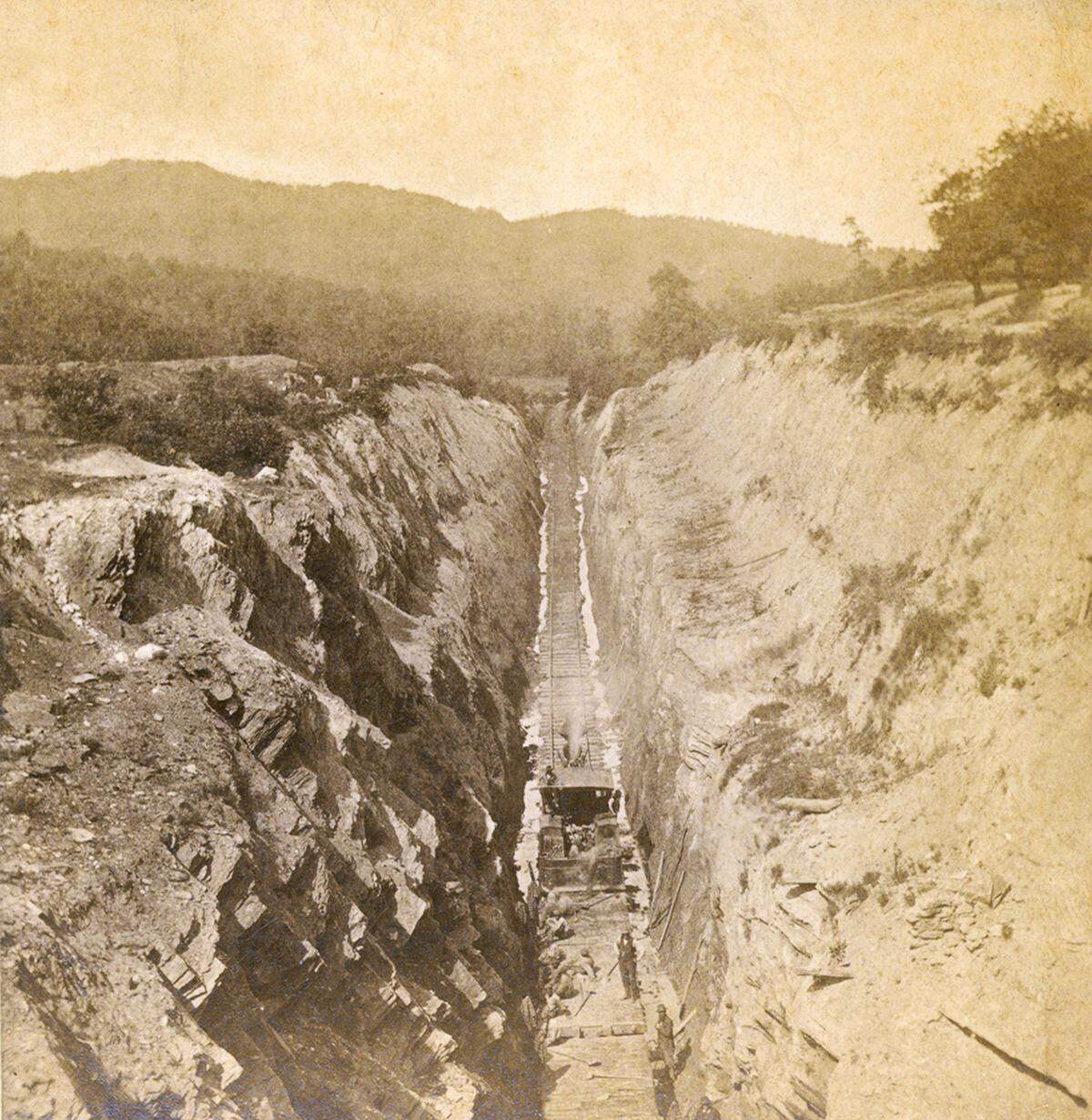 “View from summit of Swannanoa Tunnel,” a photo taken in 1878 or 1879, as state prisoners lay railroad track in the gorge below the tunnel.