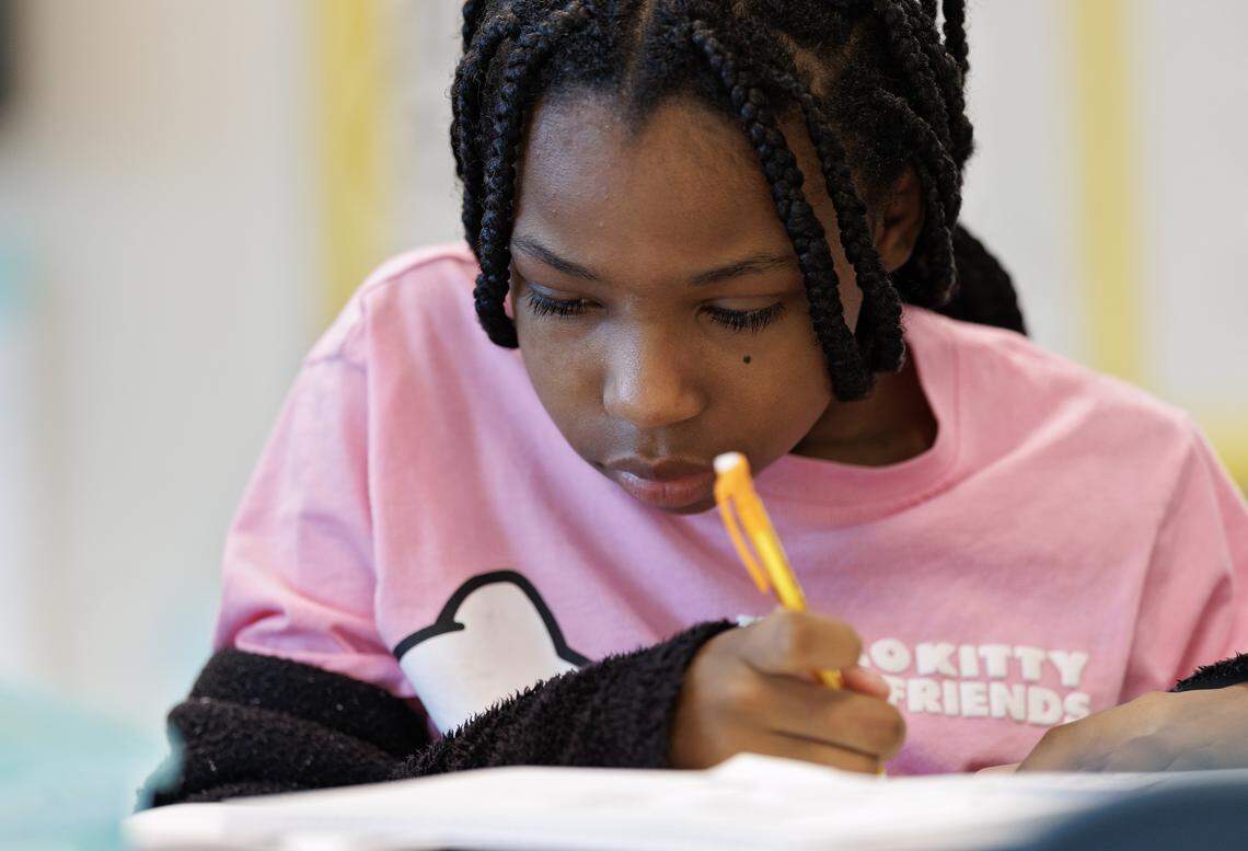 Kali Lewis works during a sixth grade English Language Arts class on Friday, Aug. 15, 2025, at Neuse River Middle School in Raleigh, N.C.