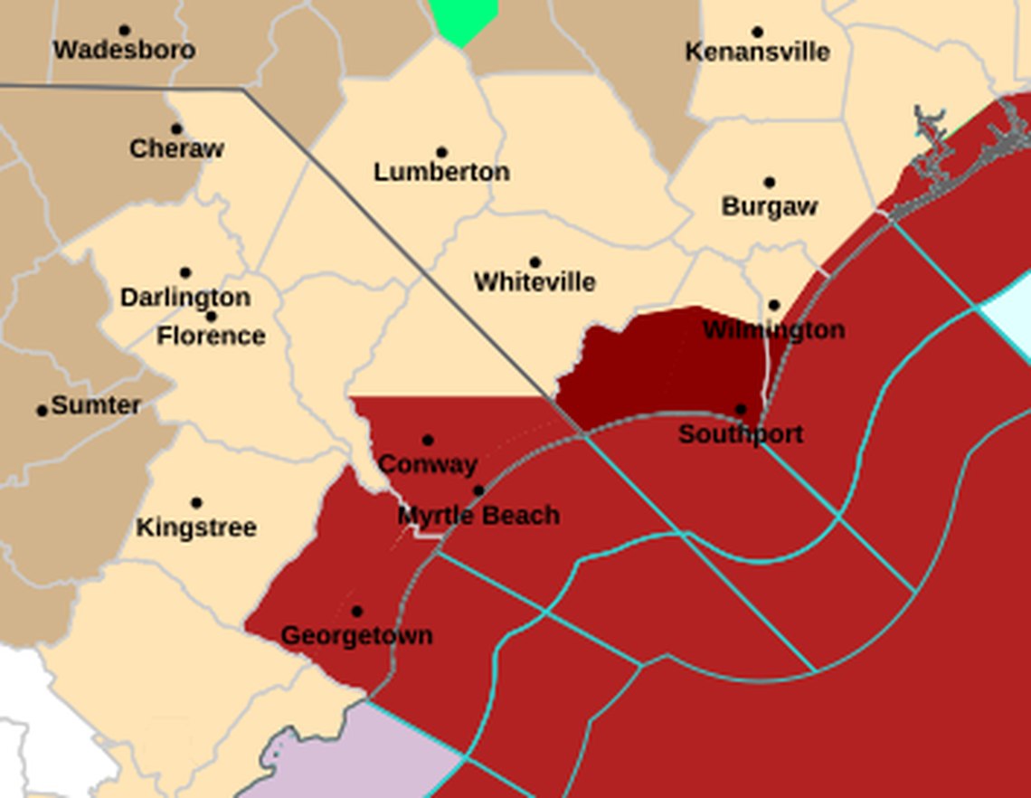 Coastal counties in southeastern North Carolina (shaded red) were under flash flood and tropical storm warnings Monday as a low-pressure system off the coast dropped more than 12 inches of rain in some places.