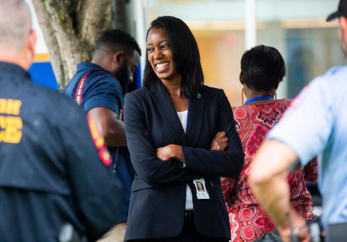 Raleigh’s new police chief Estella Patterson visits with officers during a National Night Out event at Midtown Park in North Hills, on Tuesday, Aug. 3, 2021, in Raleigh, N.C.