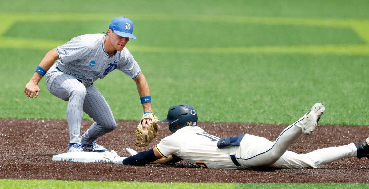 Murray State’s Dustin Mercer (10) slides safely into second before the tag by Duke’s Wallace Clark (7) on a double in the first inning during Duke’s game against Murray St. in the second game of Durham Super Regional at Jack Coombs Field in Durham, N.C., Sunday, June 8, 2025.