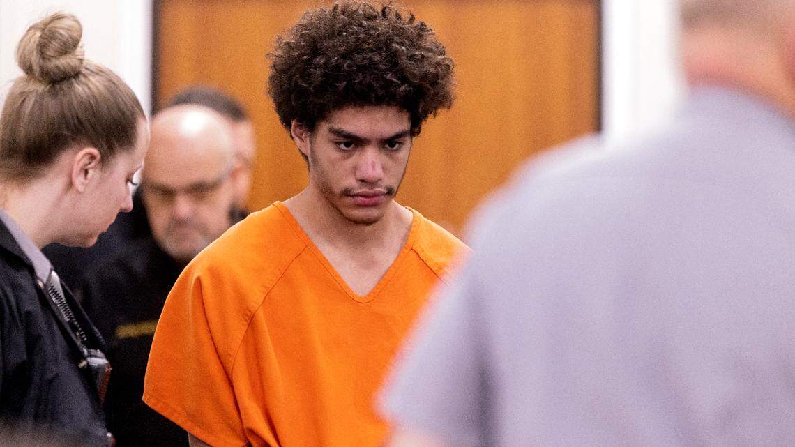 Prosecutor says NC teens were shot as they fled. Attorney says evidence not enough.