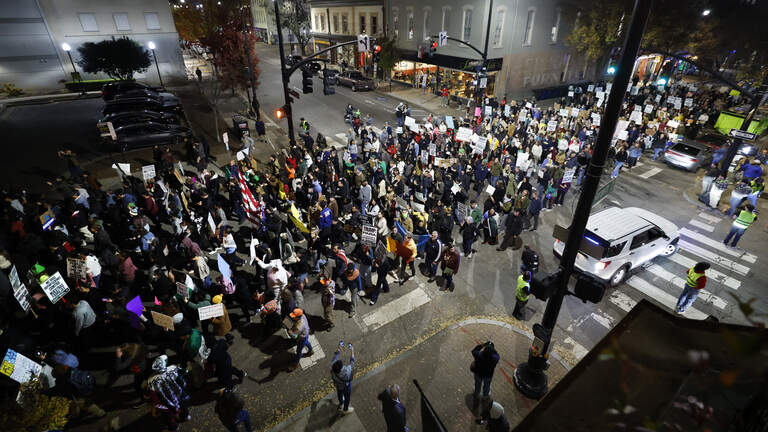 Raleigh protesters seek end to Border Patrol raids in NC | Raleigh News ...