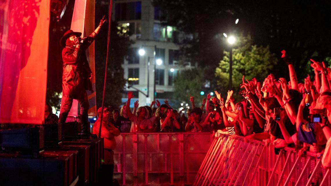 Concert-goers watch JPEGMAFIA perform at Moore Square during the Hopscotch Music Festival in Raleigh on Thursday, Sept 6, 2024.