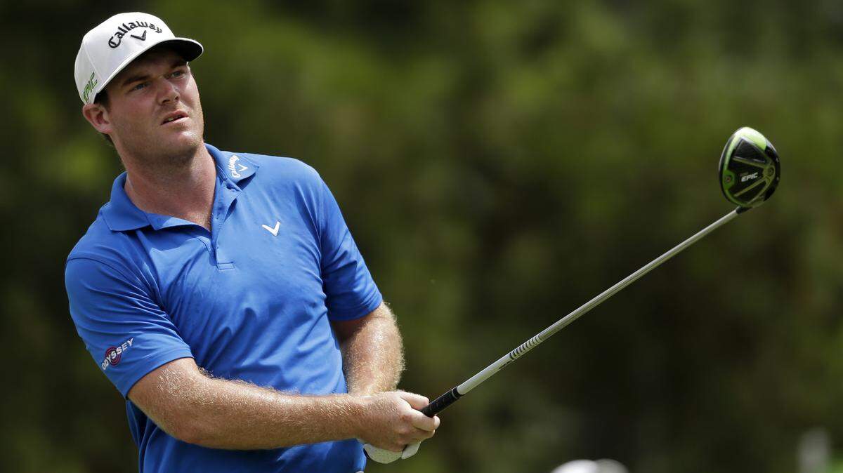 Grayson Murray watches his tee shot on the third hole during the final round of the PGA Championship golf tournament at the Quail Hollow Club Sunday, Aug. 13, 2017, in Charlotte, N.C. (AP Photo/Chuck Burton)