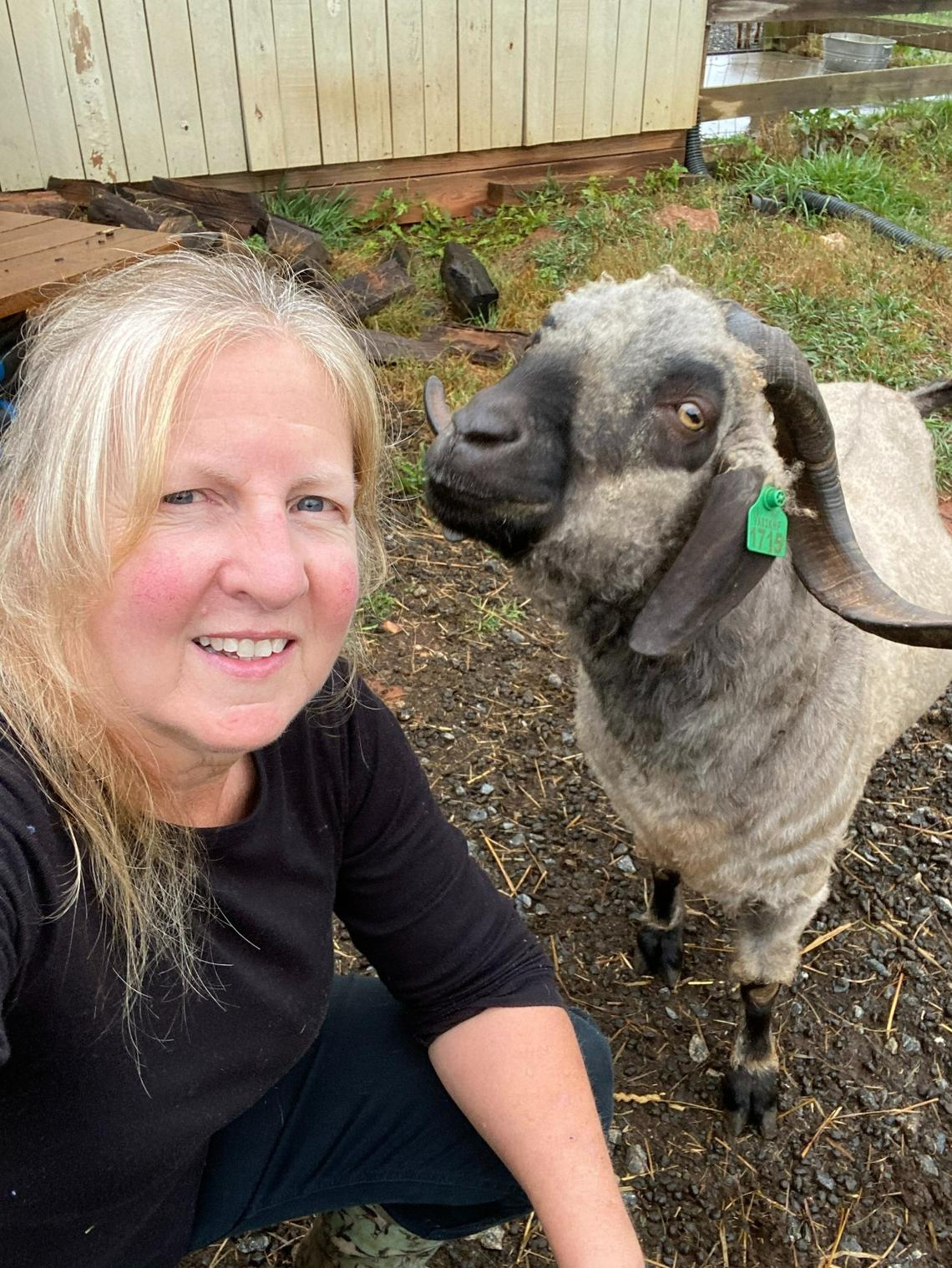 Maggie Monty, an unaffiliated voter, and Mr. B at Cherry Mountain Farm and General Store in Rutherfordton, N.C.