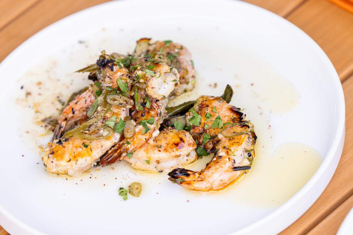 Peel n’ eat shrimp featuring sumac, soft herbs, garlic, citrus, black pepper, olive oil, pickled peppers during a soft opening Thursday June 15, 2023 at Ajja, a new restaurant from Cheetie Kumar and Paul Siler in on Bickett Blvd. in Raleigh. Ajja focuses on Mediterranean, Middle Eastern and Southwest Asian flavors.