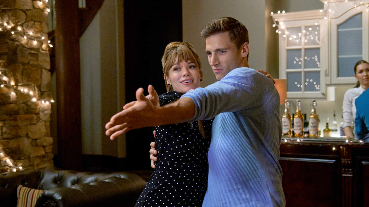 Bethany Joy Lenz, left, and Andrew Walker in the Hallmark Spring Fever movie “Bottled with Love.”
