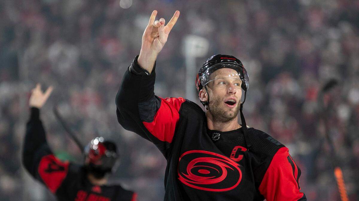 Carolina Hurricanes’ Jordan Staal (10) acknowledges fans with the Wolfpack sign, as he leaves the ice following their 4-1 victory over the Washington Capitals in the Stadium Series game on Saturday, February 18, 2022 at Carter-Finley Stadium in Raleigh, N.C.